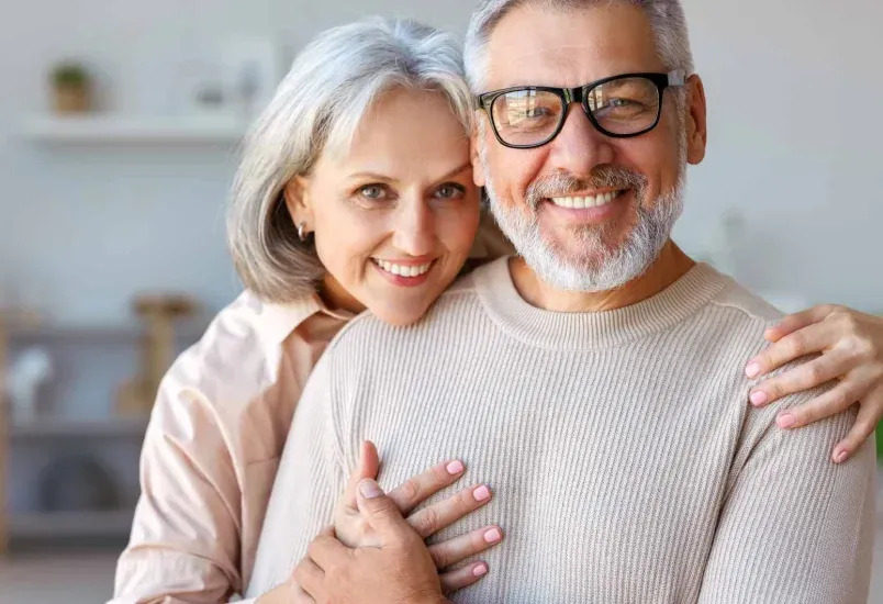 Happy patient pointing to smile